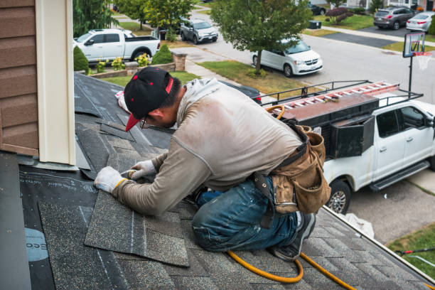 Professional Roof Repair technician working in North Bend, OR